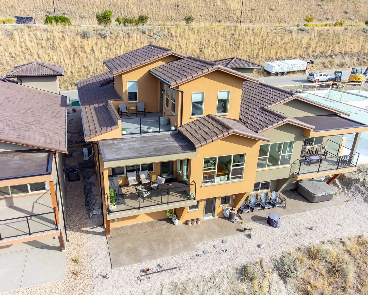 An aerial view of a Vineyard Way duplex, its decks and rooftop balcony